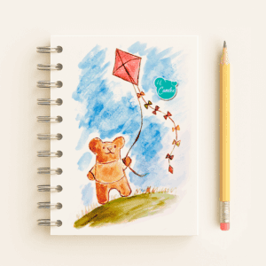 Libreta Osito Volantín con ilustración de osito elevando un volantín